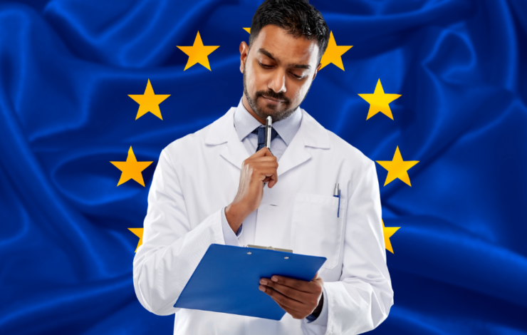 Ein Arzt checkt die harmonisierten Normen vor der EU Fahne